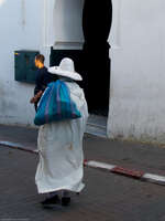tangier man carrying sack Tangier, Mediterranean, Morocco, Africa